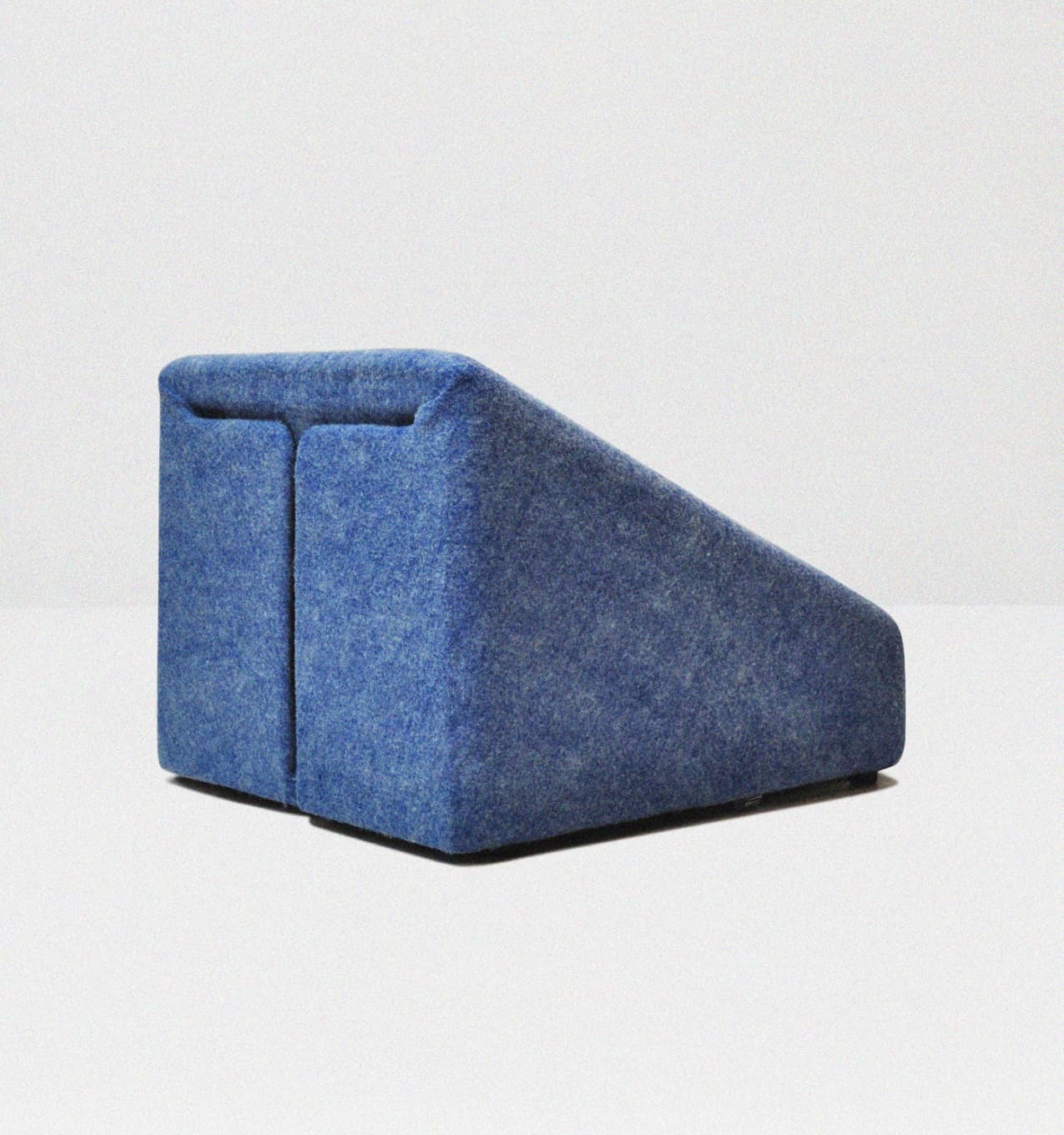 Rear view of the blue ādara® Felt chair by Roger Haan